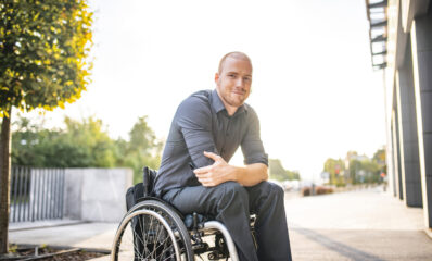 Younger man in a wheel chair - featured image to illustrate secondary progressive multiple sclerosis