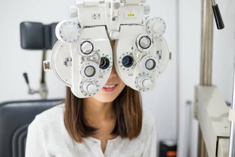 Woman having her eyes tested, featured image for a blog around help with eye test costs multiple sclerosis