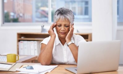 Older woman working from home, featured blog image illustrating how to work with brain fog