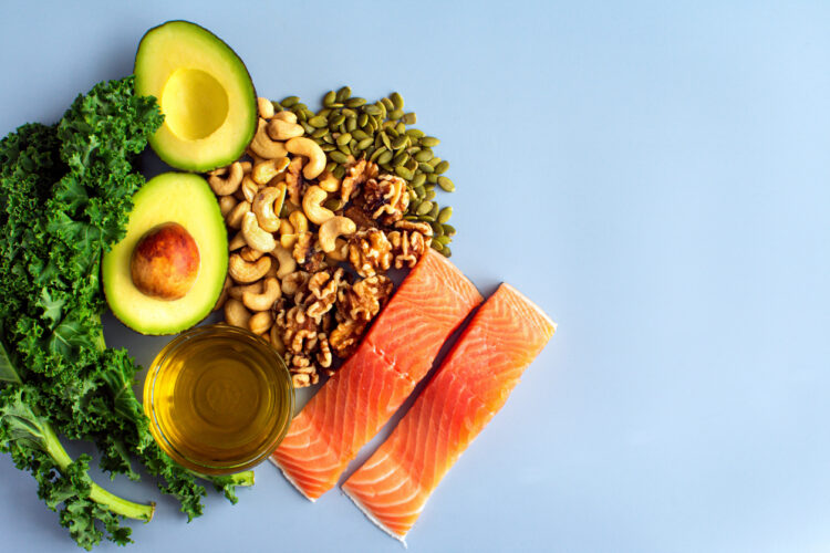 A selection of foods with unsaturated fats illustrate how Anti-inflammatory eating plus symbiotics improved symptoms in progressive MS