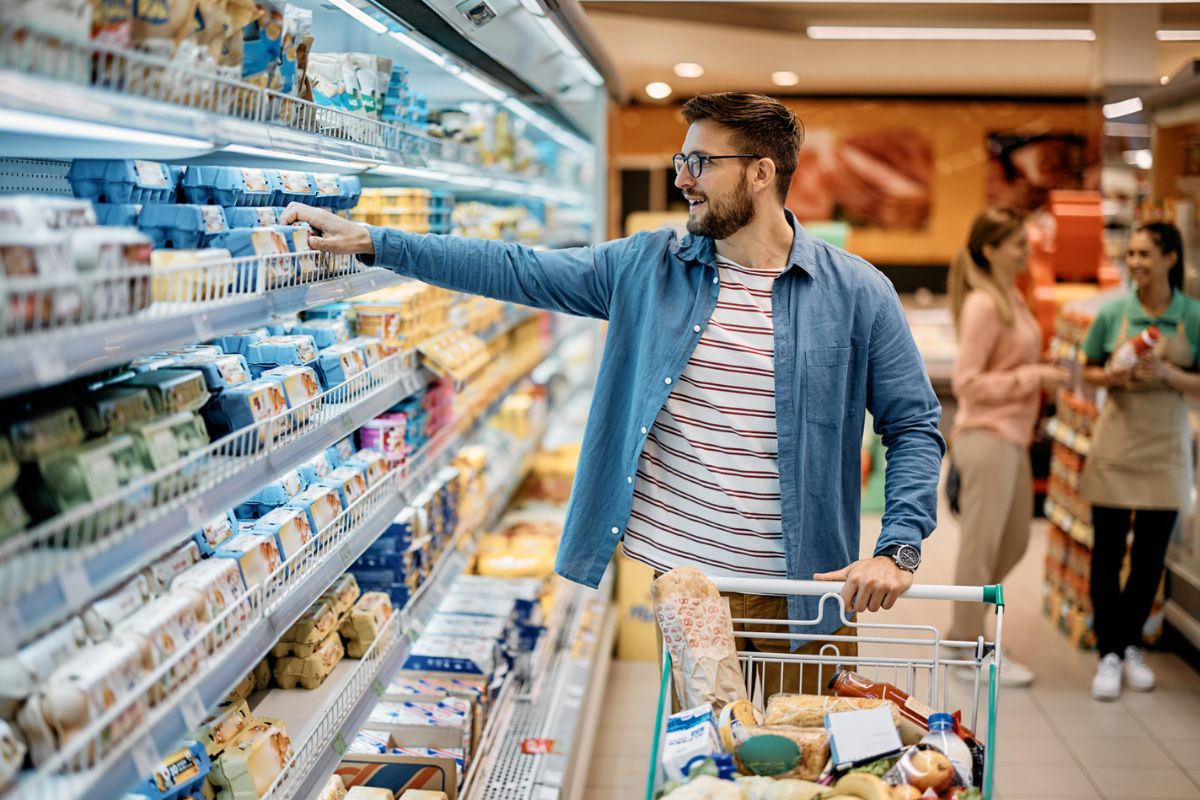 Man shopping in a supermarket