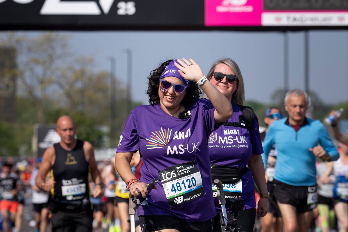 London Marathon runner Anji crossing the finishing line